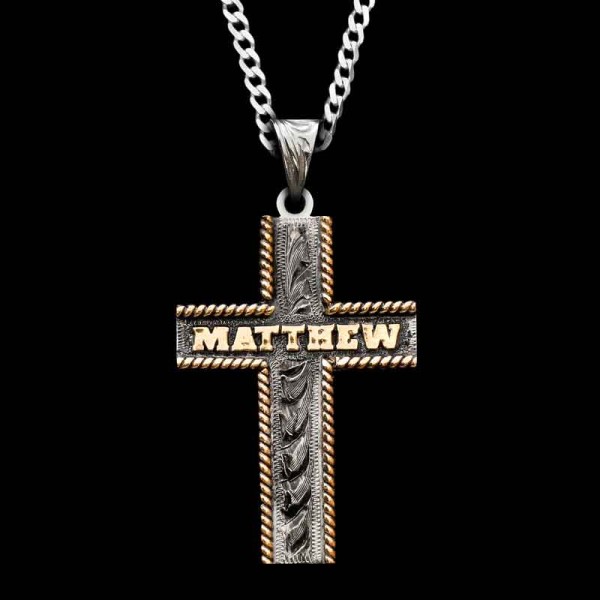 Add your name to the simple yet beautiful German Silver cross with an antique finish and hand-engraved scrolls.


Get a Sterling Silver chain at a discounted price when you buy the 'Ezra' cross! Chains are not included with this custom pendant. Browse 